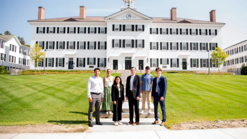 Members of the DPU stand in front of Dartmouth Hall.