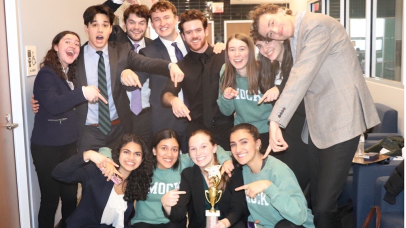 Dartmouth Mock Trial Society posing with their 3rd place trophy.