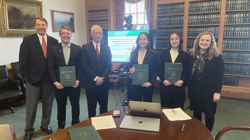 The student research team with the Justices after their final presentation.