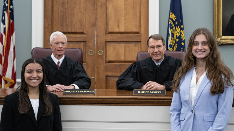 Chief Justice MacDonald and Justice Bassett with students Jessica Chiriboga '24 and Skylar Wiseman '24