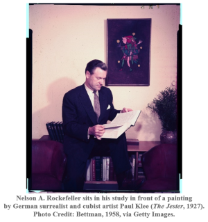 Nelson A. Rockefeller sitting in his study