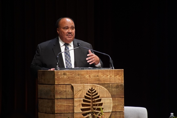 Martin Luther King III speaking at a Dartmouth lecturn