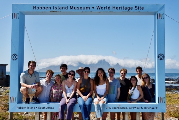 The students on Robben Island with Table Mountain in the background