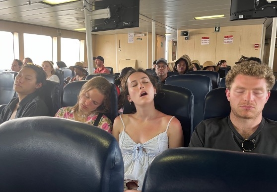Sophia, Fiona, Drew and Kate asleep on the ferry