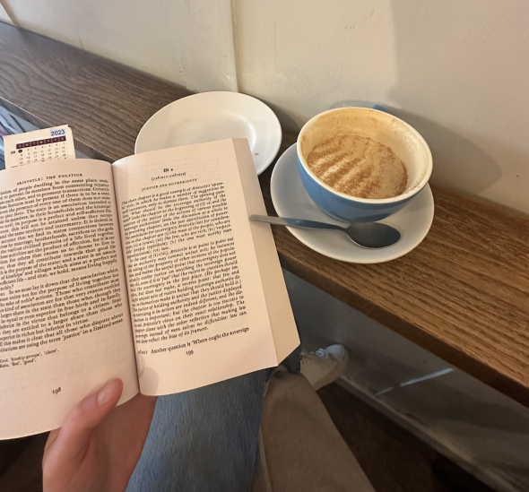 Photo of book with a cup of coffee