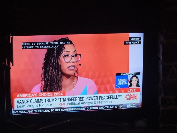 A photo of a tv showing Leah Wright Rigueur on CNN